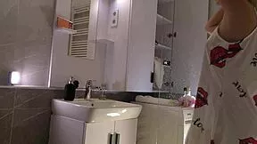 omg this super sexy blonde coed in satin nightie teases in bathroom...