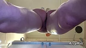 check out this cute babe's shaved pussy up close