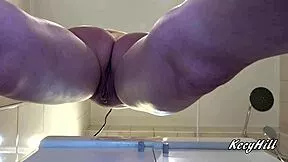 check out this cute babe's shaved pussy up close