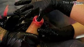 Three Latex Femdoms Dominate Tattooed Slave with Sounding Urethra Fingering Toys Heels BDSM