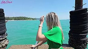 i love feeling that remote vibrator buzz in my panties while walking the beach in my dress