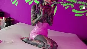 imagine a tattooed goth slut fisting her own gaping ass with toys till she squirts