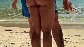 guy yanks bikini aside and pounds her hard on the beach