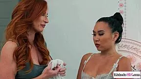 busty lesbian milf kisses and caresses petite asian stepdaughter's chest
