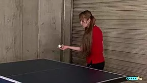 Table tennis practice turns crazy with asian teen getting wild on desk during sporty group fun