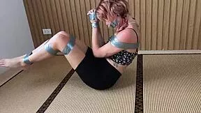 look at this redhead's sexy feet while she's duct taped