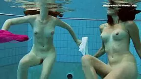 Lera and sima lastova dive sexy underwater bathing their petite russian bodies all wet and teasing!