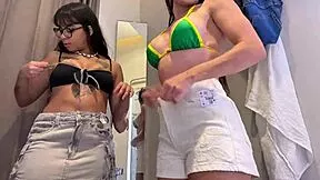 Lesbian brazilian nerds sneak pussy licks in store dressing room—what happens next?