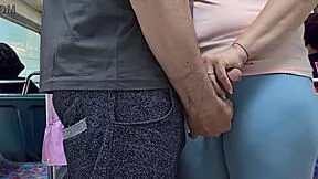 Wet amateur flashes juicy pussy lips on crowded bus for stranger handjob cum