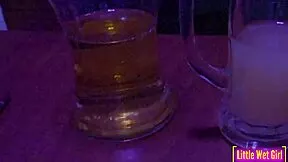 Pissing inside a vase at the bar now
