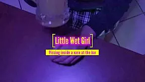 Pissing inside a vase at the bar now