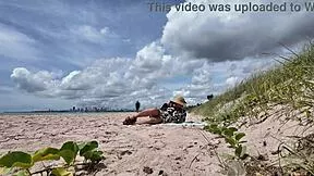 Milf flashes hairy pussy outdoors