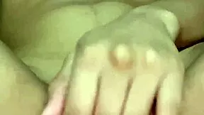 Petite babe fingers her tight wet pussy