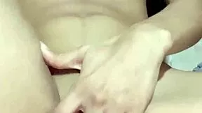 Petite babe fingers her tight wet pussy