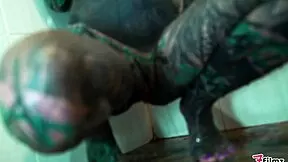 Tattooed model does intense shower anal!