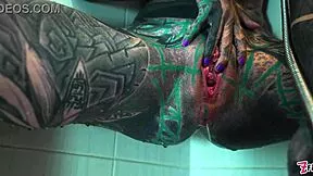 Tattooed model does intense shower anal!