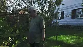 Voyeur papy licks busty wife in public garden