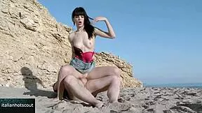 Very attractive brunette girl fucks on beach with hot male