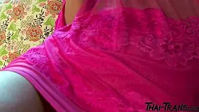 Horny Asian shemale pleases herself with anal play