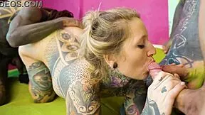 three guys take turns on the tattooed maid
