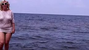 nimble mature mommy has fun with young 18+ guys on the beach 2