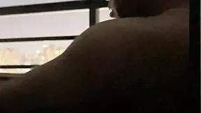 I feel thrilled sucking my roommate on the hotel balcony passionately