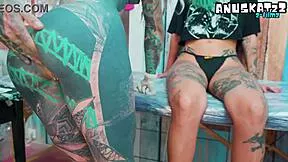 Wild anal threesome erupts during tattoo session with big cocks