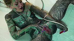 Tattooed model fingers ass and gaps in shower