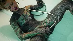 Tattooed model fingers ass and gaps in shower