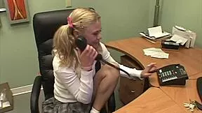 Blonde fingers herself solo on office desk
